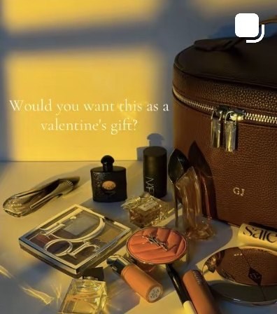 Vanity Hub TikTok post: a Valentine's gift flat lay of designer minis